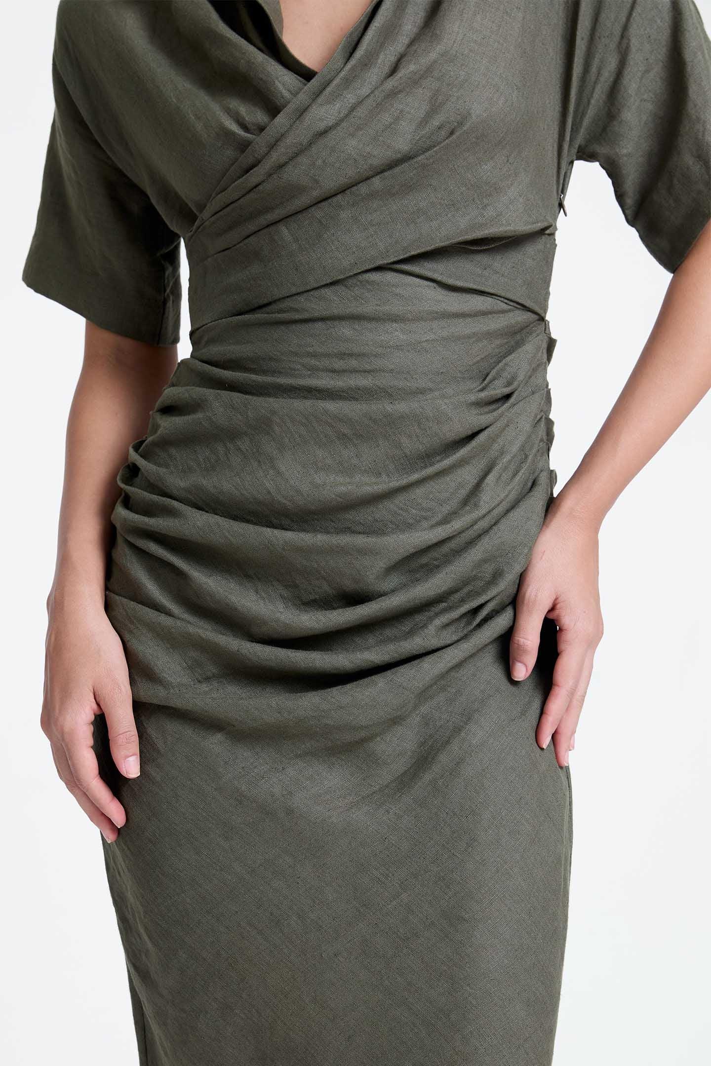 Olive green ruched midi dress with short sleeves and draped wrap detail