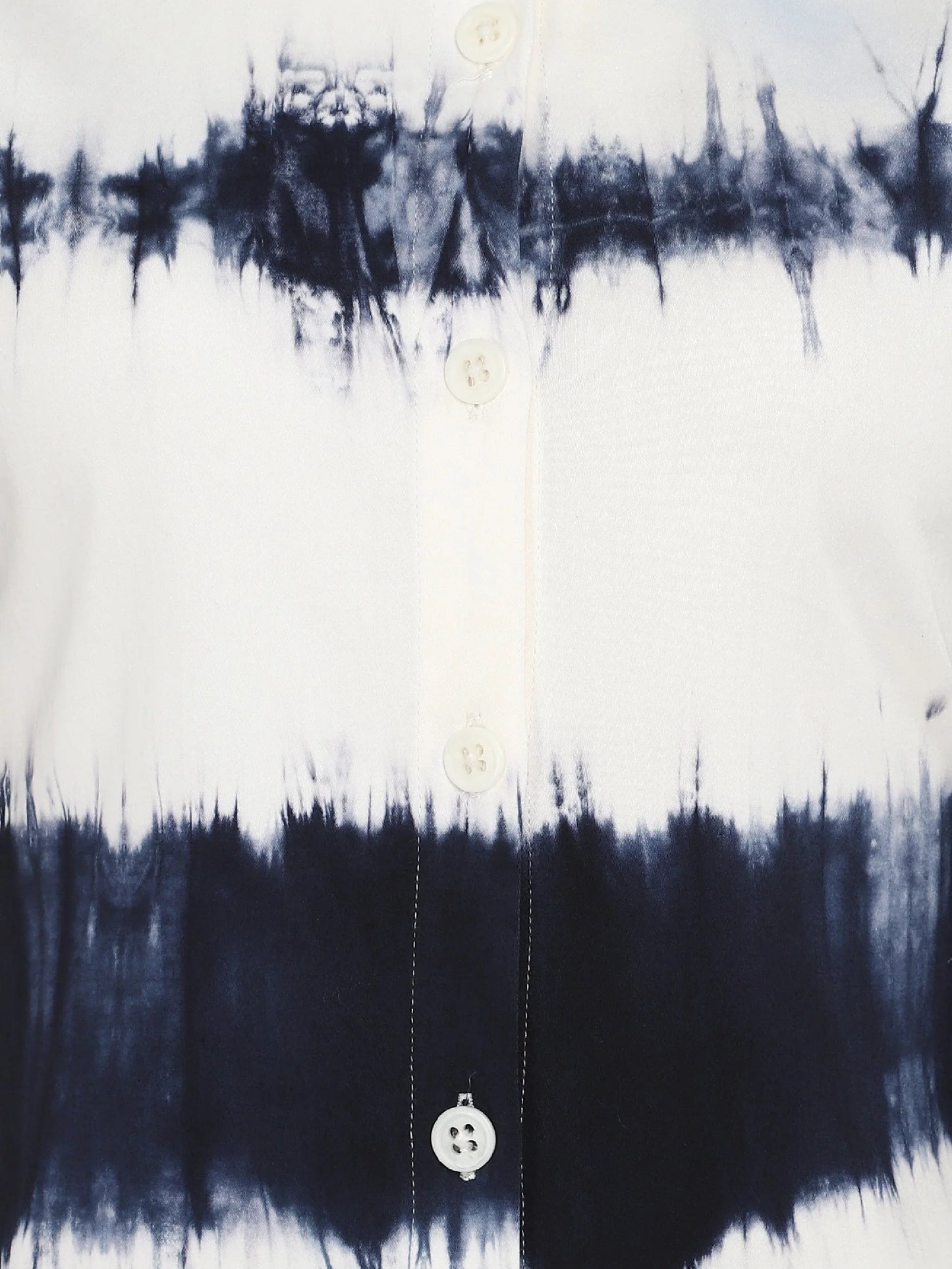 Close-up of black and white tie-dye shirt with front buttons, modern women's fashion