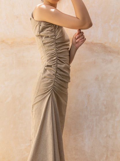 Side detail highlighting the ruching and gathered fabric on the Linen Ruched Gathered Midi Dress